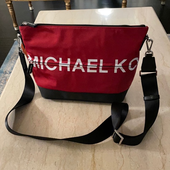 Michael Kors Handbags - NWT Authentic Michael Kors Sport MD Messenger